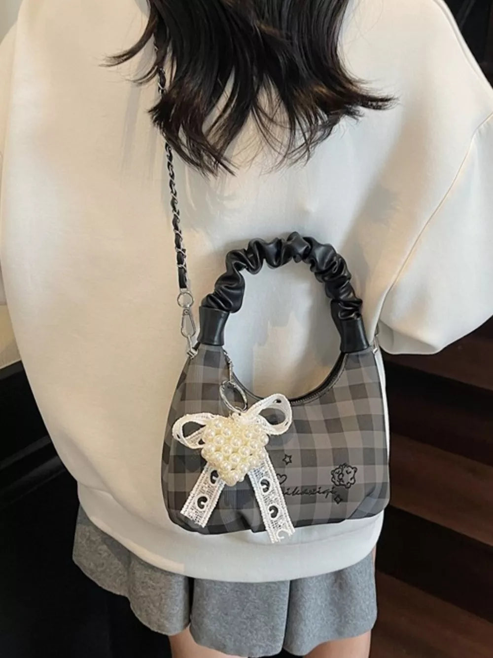 Charming mini crossbody bag with ruched handle and pearl heart charm, grey plaid