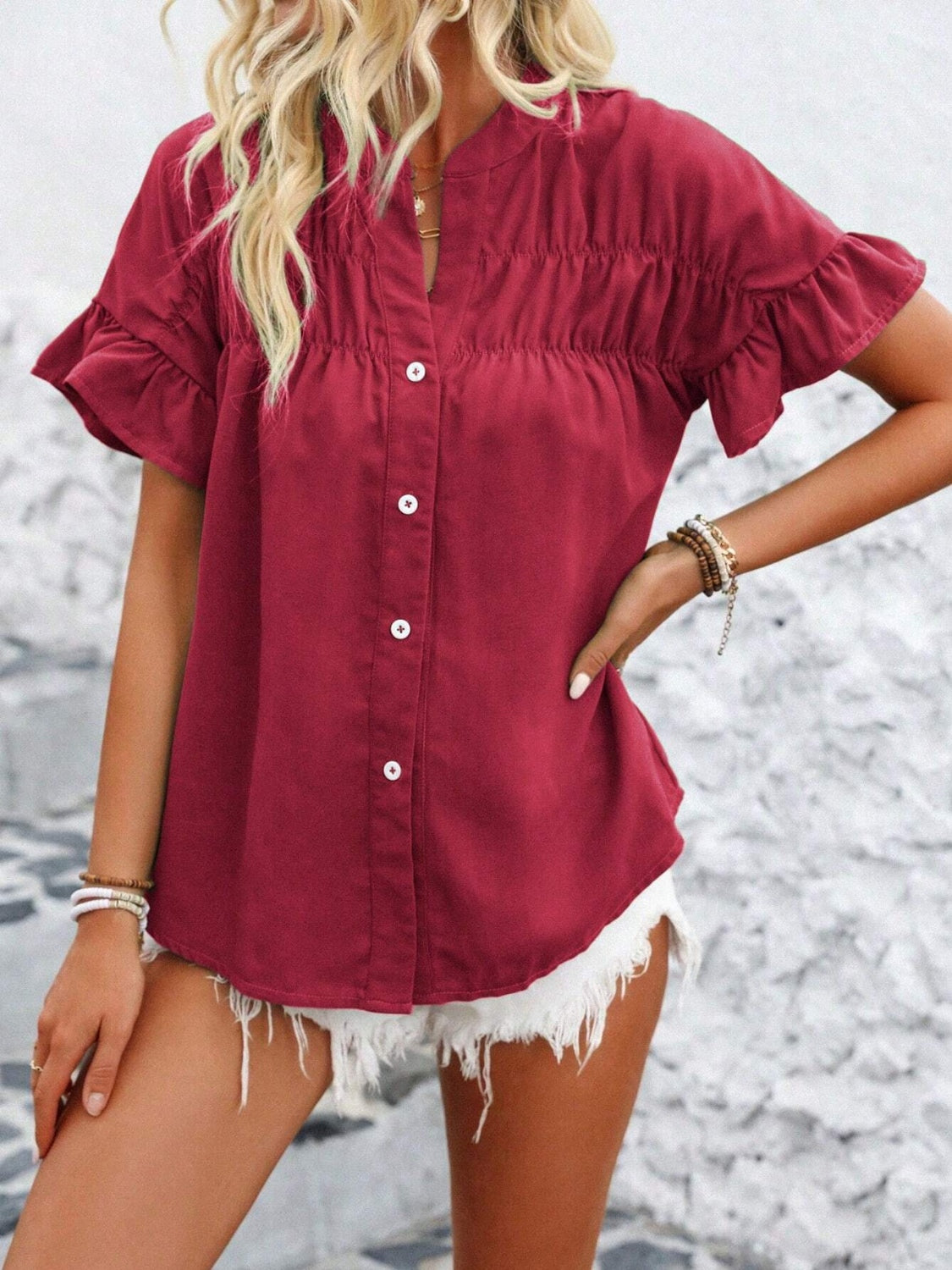 Deep Red gathered yoke blouse with ruffle sleeves and button front.