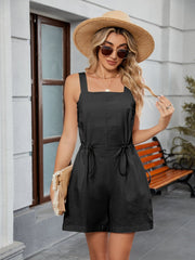 Black square-neckline romper with drawstring waist and adjustable ties.