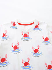 White cotton toddler t-shirt with all-over red surfing crab print and red neckline trim.