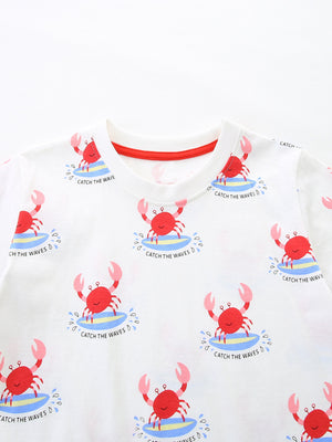 White cotton toddler t-shirt with all-over red surfing crab print and red neckline trim.