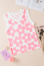 Floral pop V-neck sleeveless top in blush pink with a white contrast trim and allover flower print.