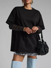 Black oversized tee with sheer sparkly sleeves