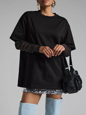 Black oversized tee with sheer sparkly sleeves