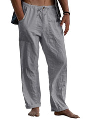 Gray linen drawstring trousers with relaxed fit and cuffed hems.