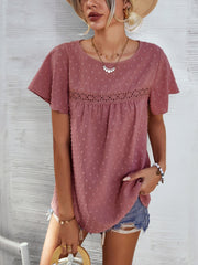 Dusty pink Swiss dot blouse with flutter sleeves and eyelet detail at the yoke.