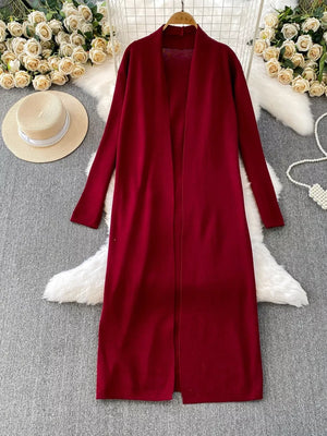 Burgundy knitted maxi dress and open front cardigan ensemble with long sleeves.