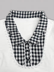 White maternity shirt with black gingham collar, lace trim, and decorative buttons.
