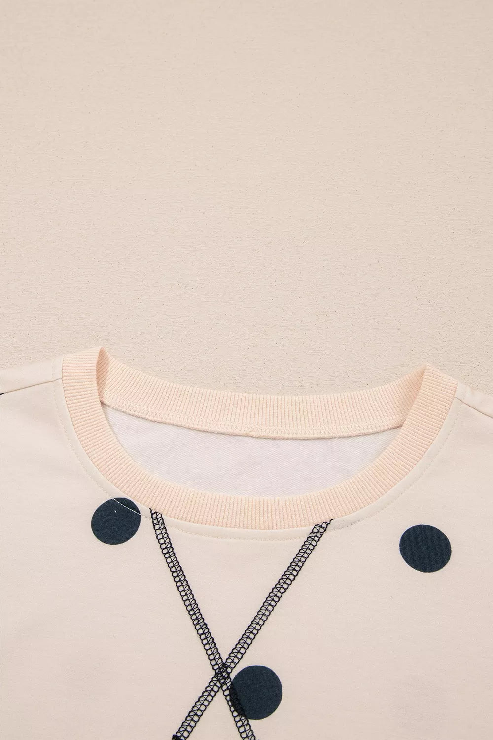 tunic in cream with ribbed cuffs and tunic-length