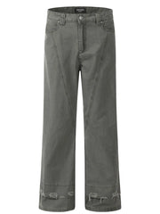 Men's grey wide-leg denim trousers with distressed hem detail