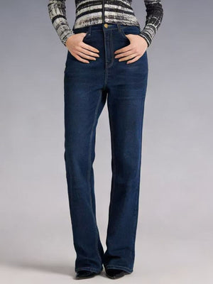 Maternity bootcut jeans in dark wash cotton with a high waist and button closure.