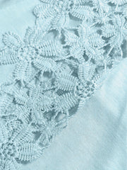 Pastel blue blouse with intricate lace yoke and sleeve detail