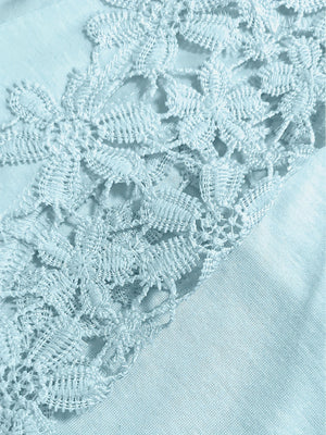 Pastel blue blouse with intricate lace yoke and sleeve detail