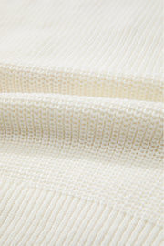 Ivory knit sweater with textured stitch detail