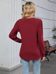 Burgundy V-neck long sleeve maternity t-shirt with gathered shoulder detail.