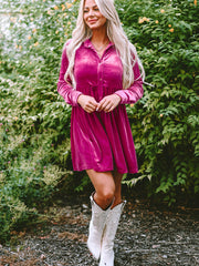 Deep Rose velvet babydoll button-down mini dress with long sleeves and a collared neckline.