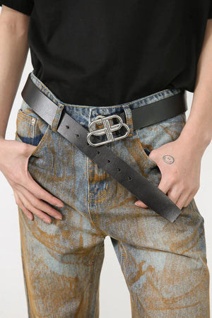Acid wash denim relaxed fit trousers in medium with a statement silver buckle.