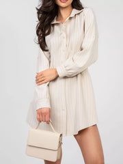Apricot striped mini shirt dress with button detail and roll-tab sleeves.