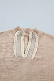 Beige crochet lace pullover with V-neck and striped inset detail
