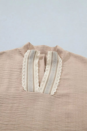 Beige crochet lace pullover with V-neck and striped inset detail