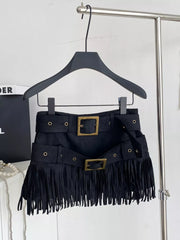 Black belted mini skirt with fringe and antique brass buckles.