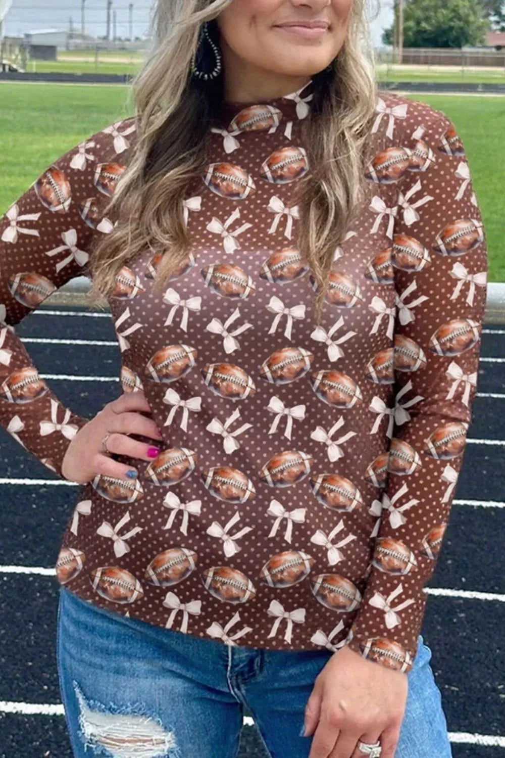 Brown sheer long sleeve t-shirt with football and bow print