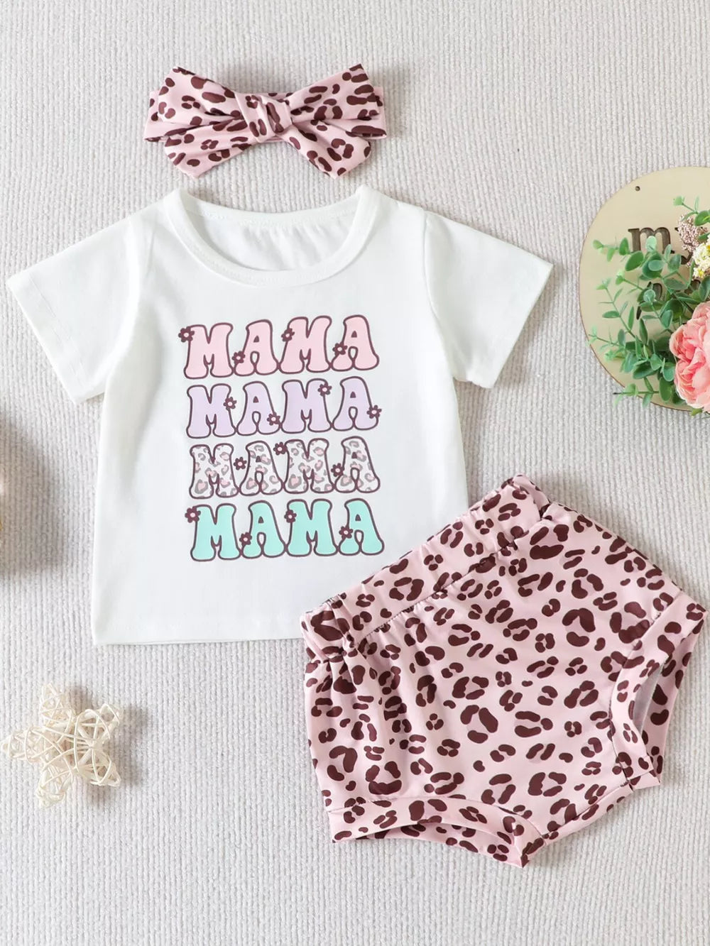 White cotton graphic tee with Mama text and leopard print shorts set with headband