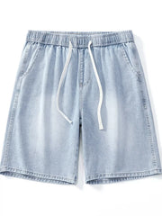 Light wash denim shorts with elastic waist and drawstring, relaxed fit.