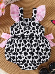 Baby one-piece with cow print, pink gingham ruffles and bows, cotton blend