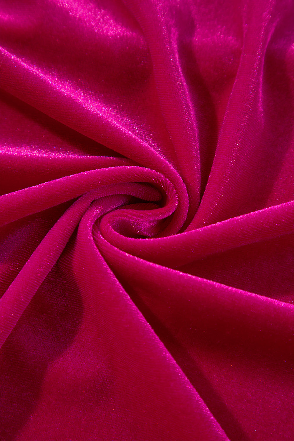 Velvet culotte set in deep rose, showing fabric texture and drape.