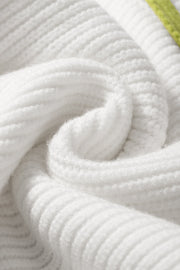 White ribbed quarter-zip pullover sweater with a subtle colorblock detail.