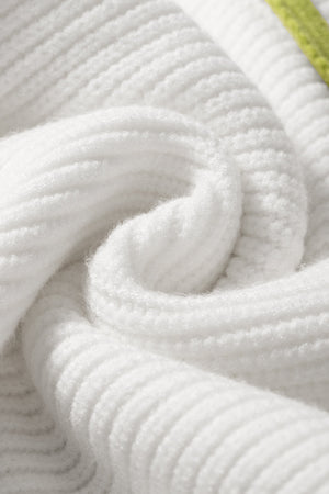 White ribbed quarter-zip pullover sweater with a subtle colorblock detail.