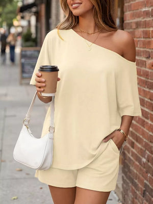 Asymmetrical one-shoulder peach set with shorts and pockets