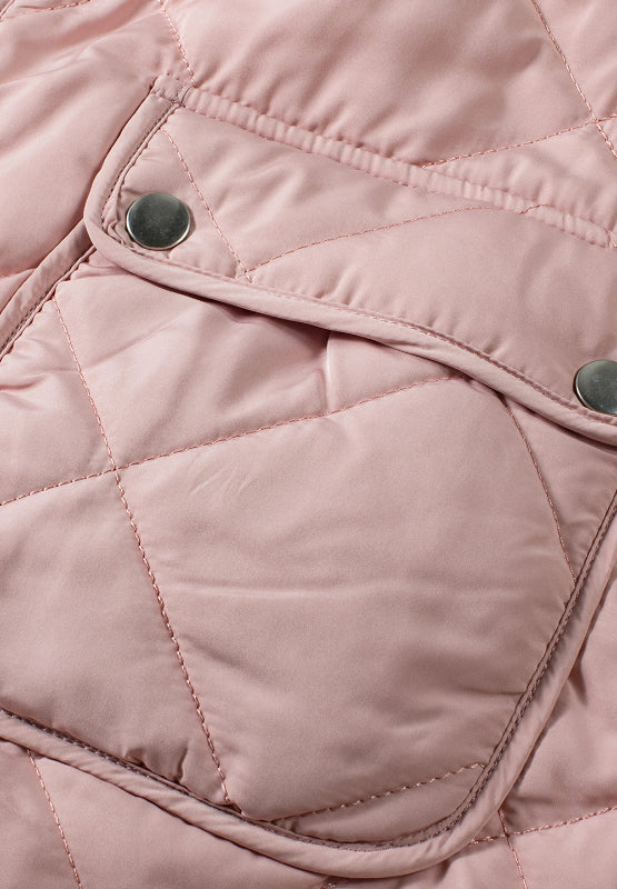 Blush pink quilted utility vest with snap pocket detail