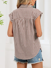 Brown gingham cotton shirt with cap sleeves and button-down front.