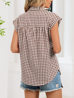 Brown gingham cotton shirt with cap sleeves and button-down front.