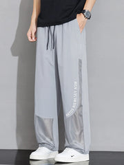 Light Gray mesh panel wide-leg sweatpants with drawstring and text detail.