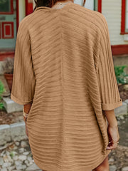 Camel ribbed knit cardigan with 3/4 sleeves and a textured pattern.
