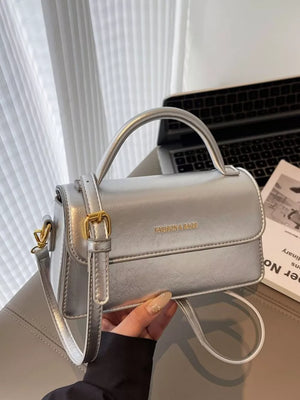 Top Handle Flap Mini Crossbody Bag in Silver, close-up detail