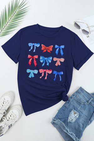 Dark blue crewneck tee with watercolor bow print, short sleeves, and casual fit.