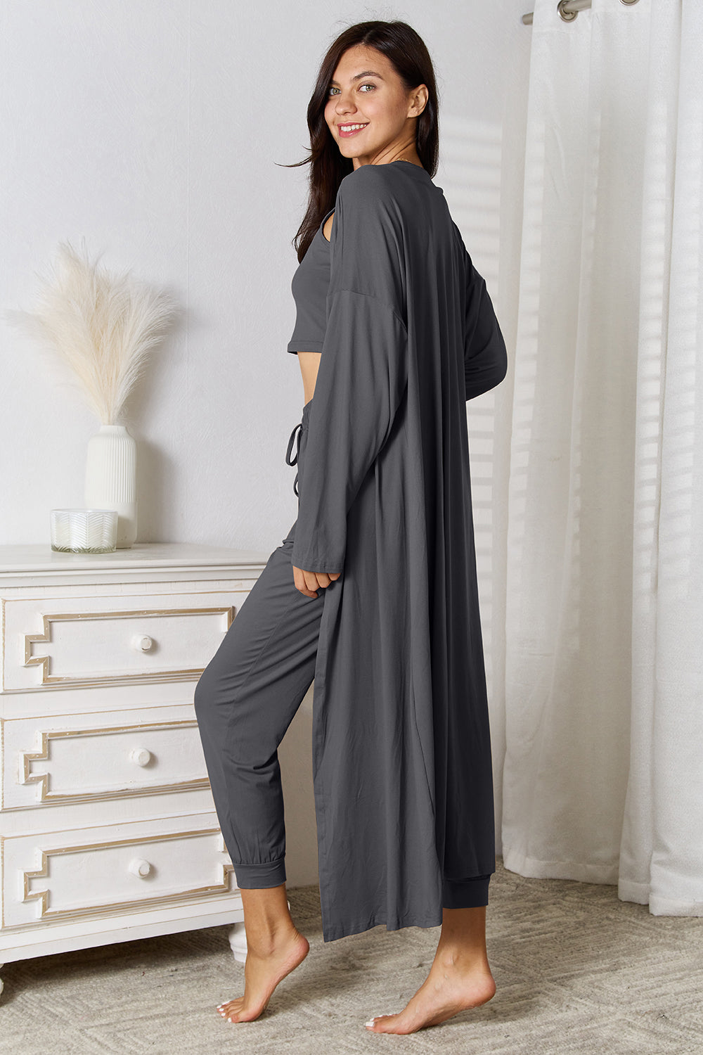 Dark gray loungewear set with long cardigan, crop top, and jogger pants.