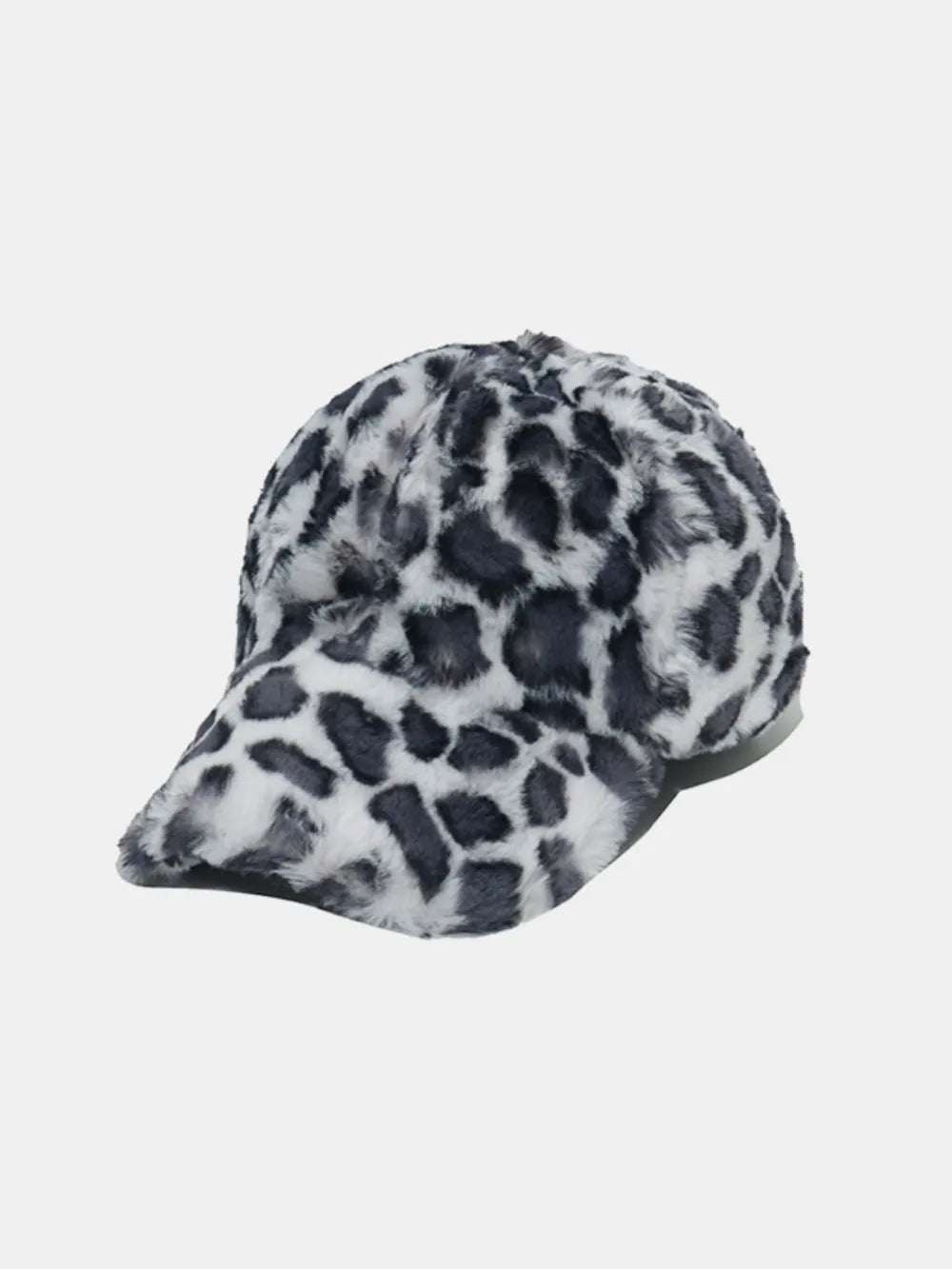 Faux fur leopard baseball cap in black and white with a curved brim.