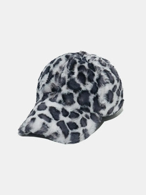 Faux fur leopard baseball cap in black and white with a curved brim.