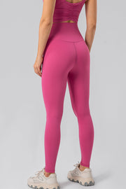Hot Pink high-waist performance leggings with a sculpted contour fit and seamless back detail.