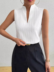 White textured sleeveless blouse with notched V-neck