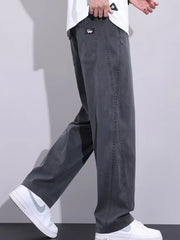 Men's grey relaxed fit sweatpants with drawstring and pockets.
