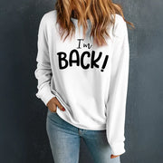 White crewneck sweatshirt with black I'm Back! graphic print