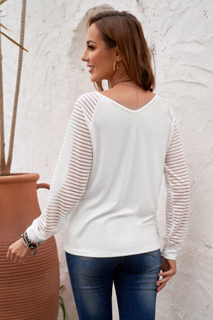 White sheer stripe raglan sleeve top with V-neck