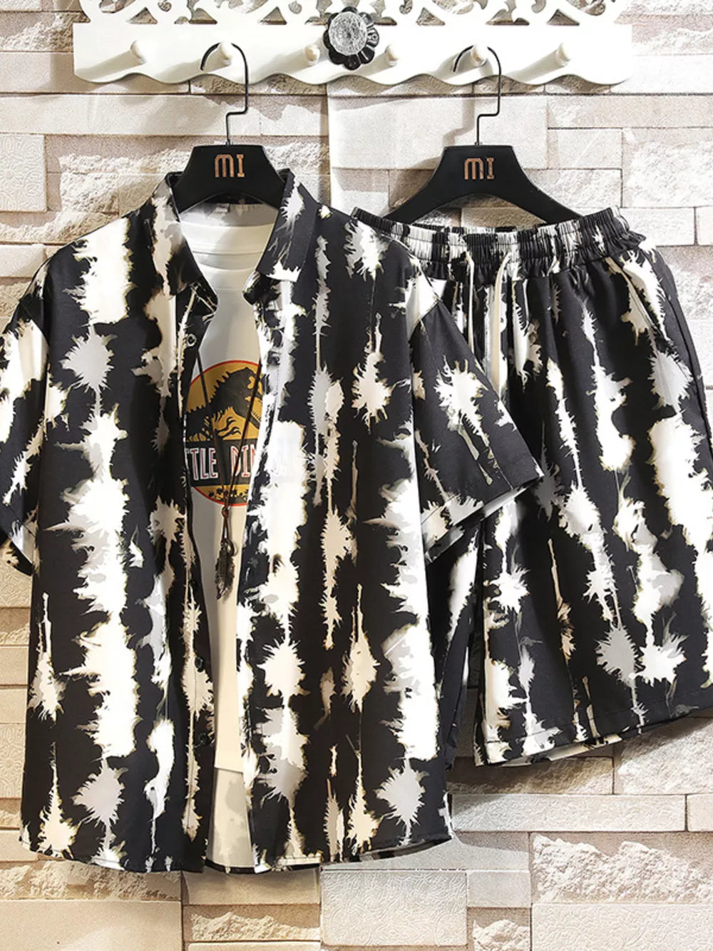 Men's abstract print short-sleeve shirt and drawstring shorts set in black and white.