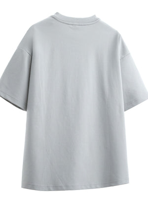 Men's oversized dusty gray cotton graphic t-shirt with crew neck and short sleeves.